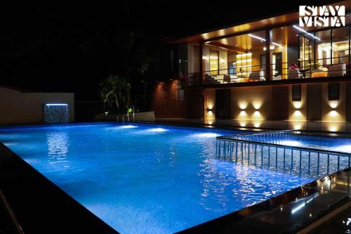 Roha Villa | StayVista at Sasha Farms in Roha with Pool, WiFi