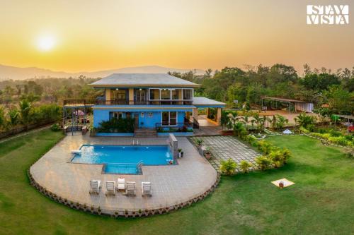 Vaijanath Villa | StayVista's Hillside Meadows - Mountainside Retreat with Farm View, Pool & Deck, Lawn & Gazebo