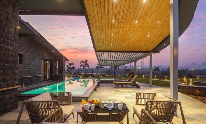 Gondedumala Villa | StayVista's Le Ciel - Lakeside Retreat Amidst Farmland with Pool, Indoor Activities, Lawn, Bonfire Pit & Ample Seating Space