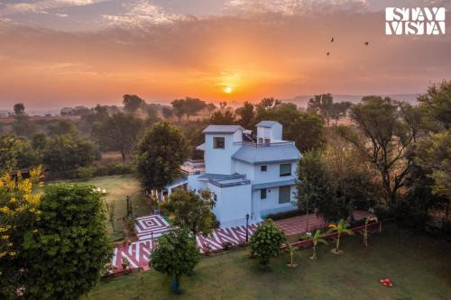 Kalwad Kalan and Khurd Villa | StayVista's Nature Ville - City Escape with Terrace-Balconies with View, Lawn & Gazebo