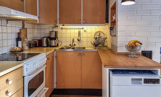 Mullsjo House | Step into a decorative cottage with a rustic flair.