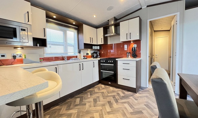 St. Andrews Cottage | Stewarts Resort Lodge 32 - a lodge that sleeps 6 guests in 3 bedrooms