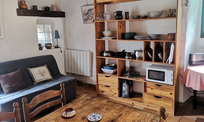 Vissec House | Stone house in the heart of Larzac, free-roaming horses and horse-drawn carriage rides