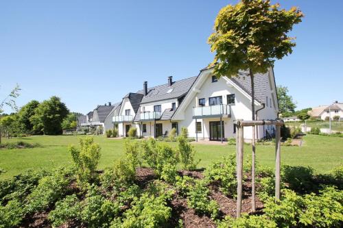 Lobbe Apartment | strandnahe FeWo mit Terrasse, gratis Nutzung vom AHOI Erlebnisbad und Sauna in Sellin - Rex Rugia FeWo 10-4