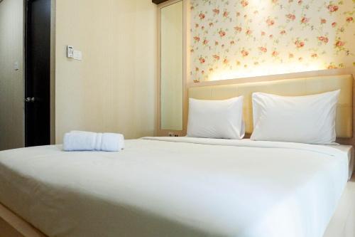 Surabaya Apartment | Strategic and Cozy Studio Room Apartment at Tamansari Papilio By Travelio