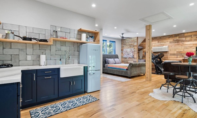 Matthews House | Studio above a detached garage away from main house on a private lot.