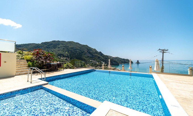 Agios Gordios Apartment | Studio Apartment "Mazis Studio B2" with Sea View, Balcony & Wi-Fi