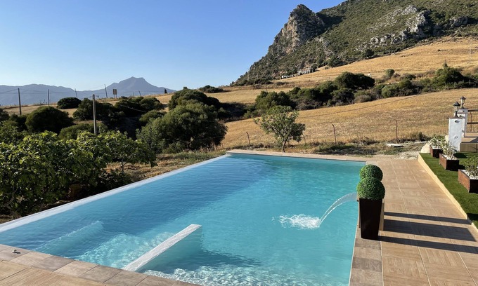 Casares Apartment | Studio apartment with infinity pool on rural finca, mountain panorama, sea view
