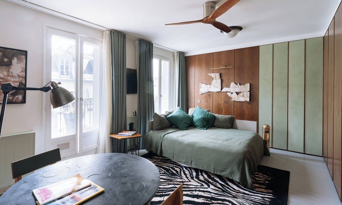 11th Arrondissement Apartment | Studio lumineux Paris 11 avec un balcon