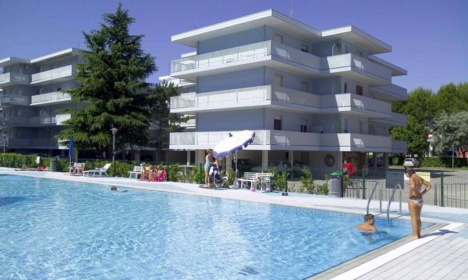 Bibione Apartment | Studio with air conditioning, balcony and pool