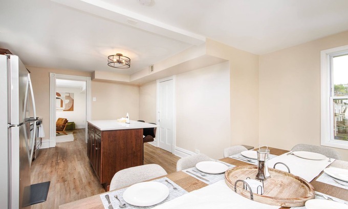 South Side Flats Apartment | Stunning City View! Sleeps 10. Kids Game Room and Large Rooftop.