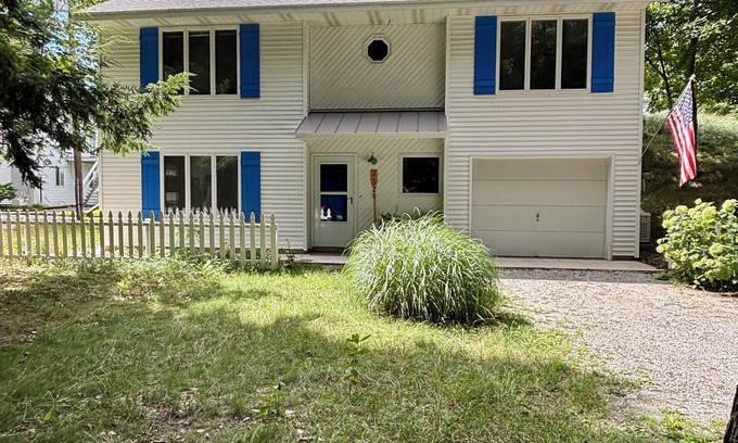 Montague House | Stunning Lake Michigan Views with 110 Feet Private Beach on One Acre.