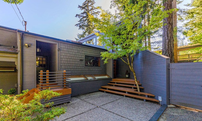 Grapeview House | Stunning lakefront home with a private dock, balcony, grill, & a hot tub