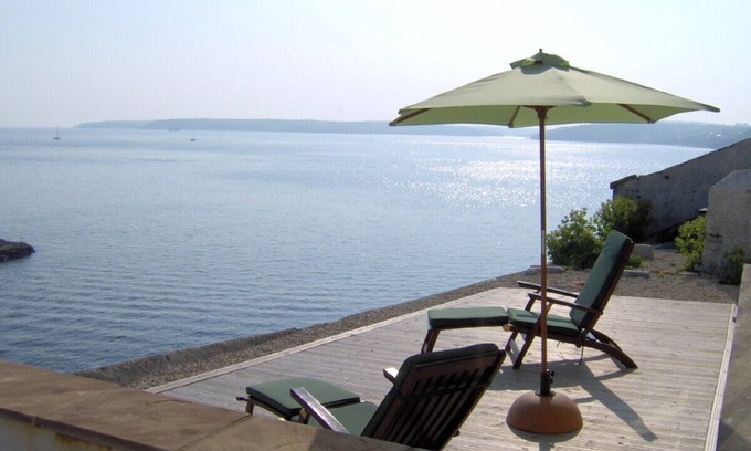 Whitegate Cottage | Stunning Lighthouse Cottage with spectacular views