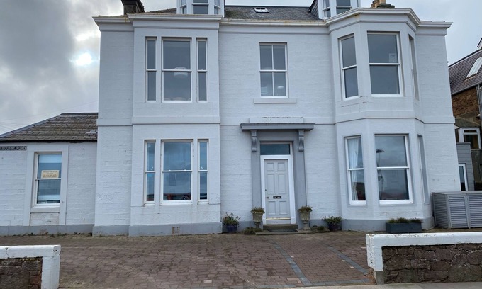 North Berwick Apartment | Stunning location - beachfront ground floor flat with private parking. Fab views