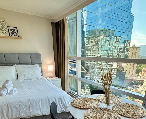 Downtown Vancouver Apartment | Stunning Skyline Views in a Cozy and Stylish Abode