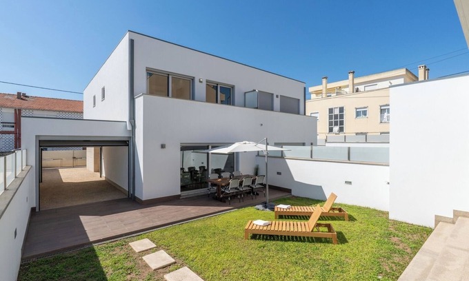 Senhora da Hora House | Stylish Home w/Garage and Terrace by HostWise