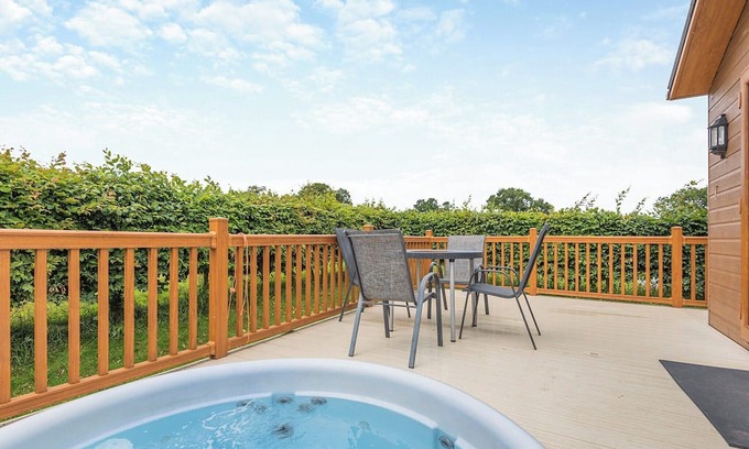 Halfway House Ski Chalet | Stylish luxury lodge with hill view.
