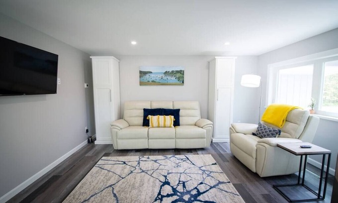 Harpswell Apartment | Stylish Treetop Loft with Balcony and Ocean Views
