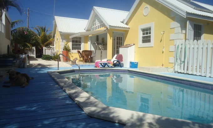 Bottom Bay Apartment | Stylish villa apt, world famous Bottom Bay 5 min walk,swimming pool.A/C