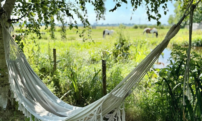Landsmeer Villa | Stylish waterfront villa with luxurious private wellness, 5 min. From Amsterdam