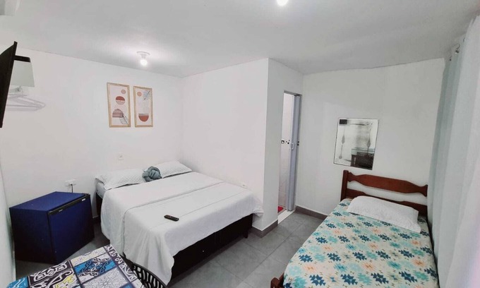 Taio Apartment | Suíte Privativa Praia dos Anjos