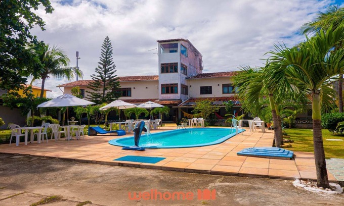 Itapua House | Suíte em Itapuã com piscina e perto da praia