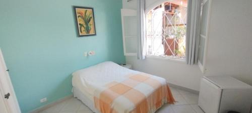 Enseada House | Suítes Casa Branca