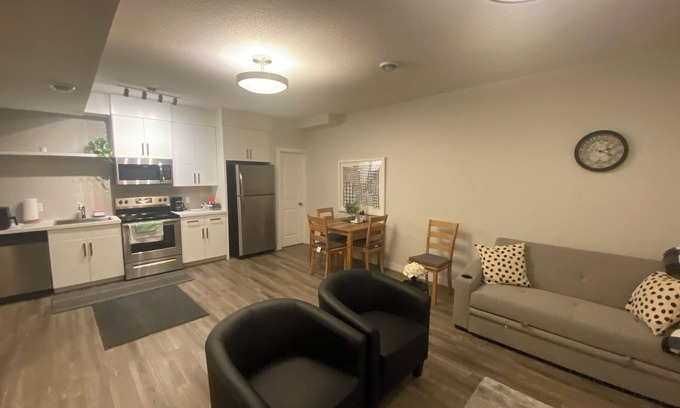 Calgary House | Suite close to the airport in Calgary with dedicated concrete pad for parking