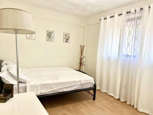 Dasmarinas Apartment | Suite Dreams Staycation - Cozy 2-BR - Wi-Fi Garden Kitchen