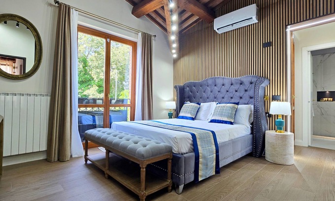 Manciano Apartment | Suite with private bathroom and views of Tuscan hills
