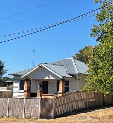 Golden Point House | Sunny room shared house