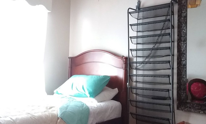 Irvington House | Sunny Window by the Bed