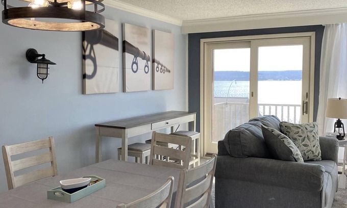 Dewittville Condo | Sunset Shores Family-Friendly Lake Condo in Mayville Pool, AC, Private Deck!