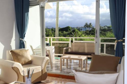 Trou d'Eau Douce Apartment | Sunset view Suite