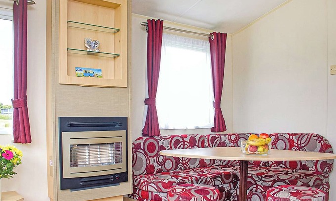 Looe House | Superior caravan with one double and one twin.