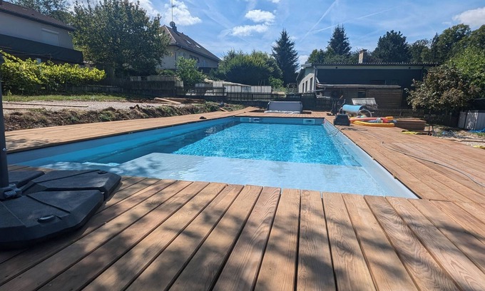 Herimoncourt Apartment | Swimming pool, jacuzzi, terrace and games for young and old, 5km from Switzerland!