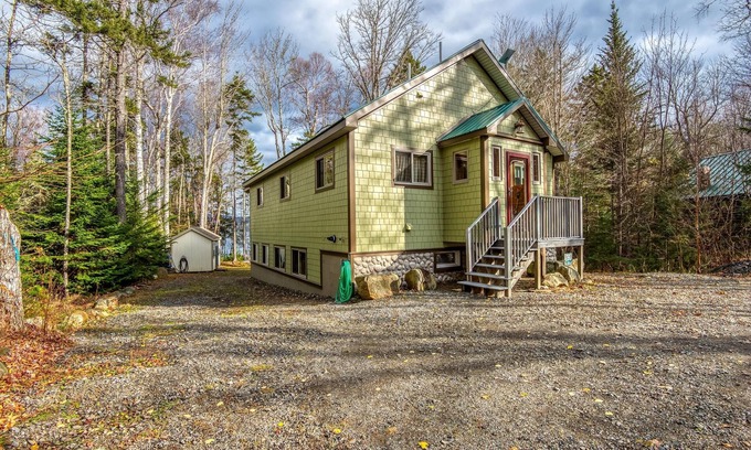Rangeley House | The 4 Seasons on Mooselookmeguntic Lake with dock, mooring, 4 kayaks, fire pit, and pet friendly!
