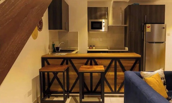 Roman Ridge Apartment | The Avery Loft at Embassy Gardens, Cantonments