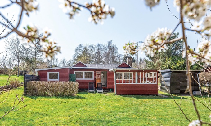 Holbaek House | The charming cottage is located by the forest Bognæs Skov, a good destination for hiking.