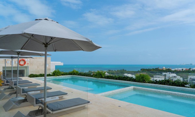 Zona Hotelera Apartment | The Double View - Lavish Ocean View Condo