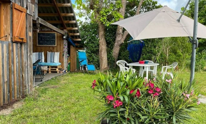 Le Porge Ski Chalet | The little blue cabin hidden in the meadow