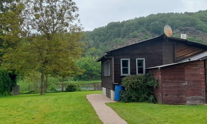 Fepin Ski Chalet | The Meuse is at the end of the garden