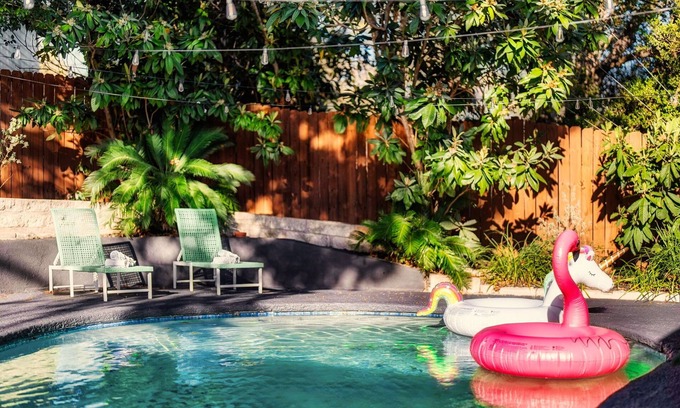 University Hills House | The Palm Royale: Mid century pool home in trendy East Austin sleeps 12!