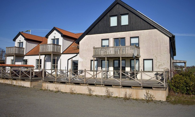Glemminge House | The renovated cottage on a round yard with beautiful views of the open countryside just outside the