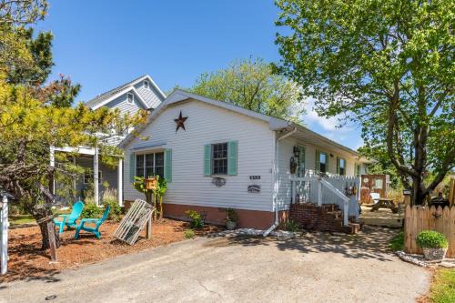 Caine Woods House | The Seashell Cottage