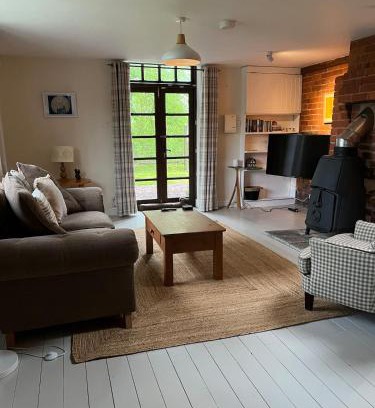 Bodenham House | The Smithy, Wonderful Riverside Accommodation