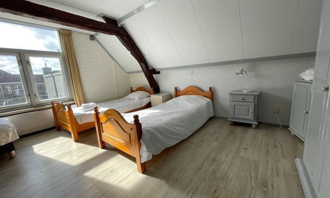 Geertruidenberg Hotel | The spacious living area and three bedrooms provide ample space for your group.