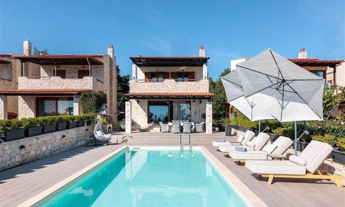 Afytos Villa | The Stone of Zeus Villa Afitos 4 bedrooms 14 guests