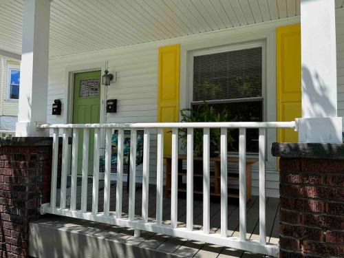 Sharon House | The Yellow-Shuttered House apt B
